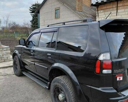 Черный Мицубиси Паджеро, объемом двигателя 2.48 л и пробегом 235 тыс. км за 12000 $, фото 4 на Automoto.ua