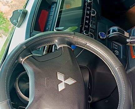 Чорний Міцубісі Паджеро, об'ємом двигуна 3 л та пробігом 179 тис. км за 11700 $, фото 3 на Automoto.ua