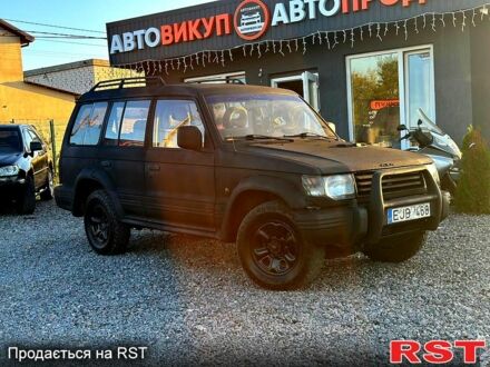 Черный Мицубиси Паджеро, объемом двигателя 2.5 л и пробегом 300 тыс. км за 2800 $, фото 1 на Automoto.ua