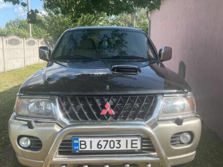 Міцубісі Паджеро 2001 у Новых Санжарах на Automoto.ua Чорний Міцубісі Паджеро, об'ємом двигуна 2.5 л та пробігом 250 тис. км за 8700 $, фото 1 на Automoto.ua