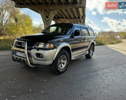 Черный Мицубиси Паджеро, объемом двигателя 3 л и пробегом 293 тыс. км за 4599 $, фото 1 на Automoto.ua