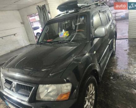 Чорний Міцубісі Паджеро, об'ємом двигуна 3 л та пробігом 402 тис. км за 7500 $, фото 1 на Automoto.ua