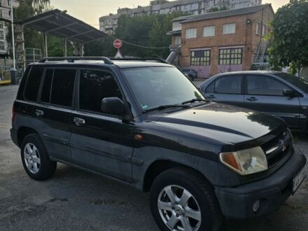 Чорний Міцубісі Паджеро, об'ємом двигуна 2 л та пробігом 216 тис. км за 2400 $, фото 1 на Automoto.ua