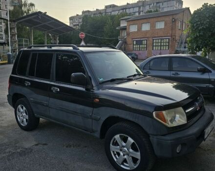 Чорний Міцубісі Паджеро, об'ємом двигуна 2 л та пробігом 216 тис. км за 2400 $, фото 1 на Automoto.ua