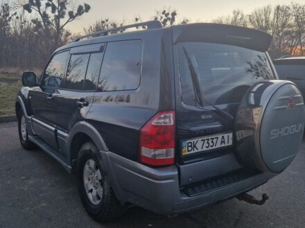 Чорний Міцубісі Паджеро, об'ємом двигуна 3 л та пробігом 310 тис. км за 6800 $, фото 1 на Automoto.ua