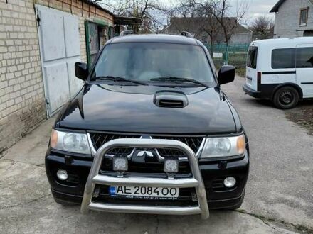 Чорний Міцубісі Паджеро, об'ємом двигуна 2.48 л та пробігом 235 тис. км за 12000 $, фото 1 на Automoto.ua