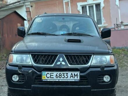 Черный Мицубиси Паджеро, объемом двигателя 2.48 л и пробегом 104 тыс. км за 8700 $, фото 1 на Automoto.ua