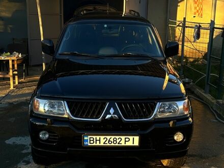 Чорний Міцубісі Паджеро, об'ємом двигуна 3 л та пробігом 148 тис. км за 9000 $, фото 1 на Automoto.ua