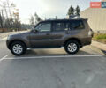Коричневый Мицубиси Паджеро, объемом двигателя 3 л и пробегом 143 тыс. км за 13900 $, фото 1 на Automoto.ua