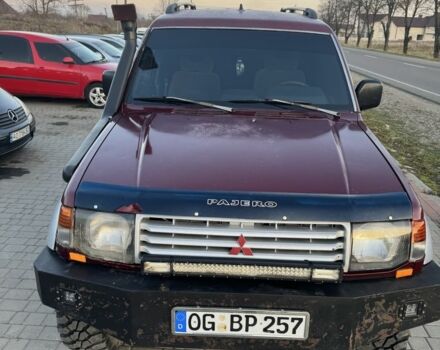 Красный Мицубиси Паджеро, объемом двигателя 2.5 л и пробегом 250 тыс. км за 5700 $, фото 1 на Automoto.ua