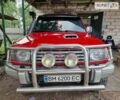 Красный Мицубиси Паджеро, объемом двигателя 2.5 л и пробегом 220 тыс. км за 8000 $, фото 2 на Automoto.ua