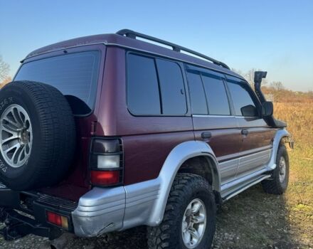 Красный Мицубиси Паджеро, объемом двигателя 2.5 л и пробегом 250 тыс. км за 5700 $, фото 16 на Automoto.ua