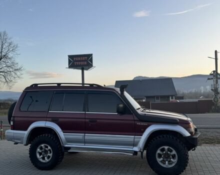 Красный Мицубиси Паджеро, объемом двигателя 2.5 л и пробегом 250 тыс. км за 5700 $, фото 2 на Automoto.ua