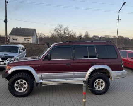 Красный Мицубиси Паджеро, объемом двигателя 2.5 л и пробегом 250 тыс. км за 5700 $, фото 3 на Automoto.ua