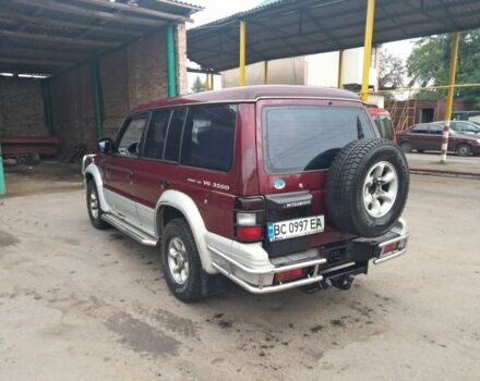 Красный Мицубиси Паджеро, объемом двигателя 3.5 л и пробегом 200 тыс. км за 4599 $, фото 2 на Automoto.ua