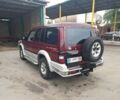Красный Мицубиси Паджеро, объемом двигателя 3.5 л и пробегом 200 тыс. км за 4599 $, фото 2 на Automoto.ua