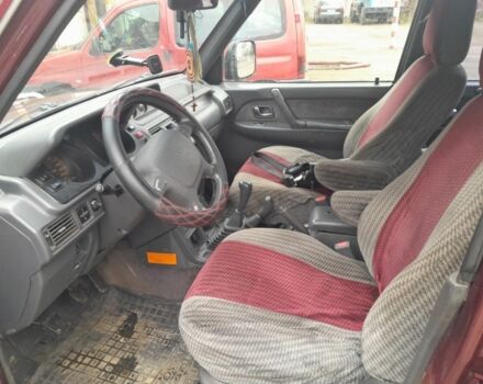 Красный Мицубиси Паджеро, объемом двигателя 3.5 л и пробегом 200 тыс. км за 4599 $, фото 4 на Automoto.ua