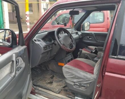 Красный Мицубиси Паджеро, объемом двигателя 3.5 л и пробегом 200 тыс. км за 4599 $, фото 3 на Automoto.ua