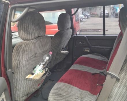 Красный Мицубиси Паджеро, объемом двигателя 3.5 л и пробегом 200 тыс. км за 4599 $, фото 5 на Automoto.ua