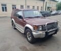 Красный Мицубиси Паджеро, объемом двигателя 3.5 л и пробегом 200 тыс. км за 4599 $, фото 1 на Automoto.ua