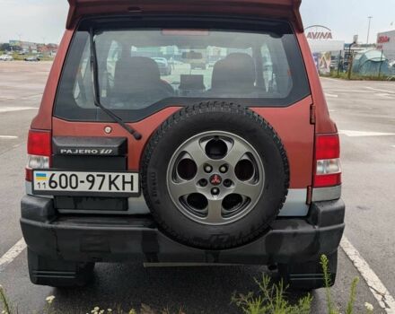 Красный Мицубиси Паджеро, объемом двигателя 1.8 л и пробегом 247 тыс. км за 4674 $, фото 3 на Automoto.ua