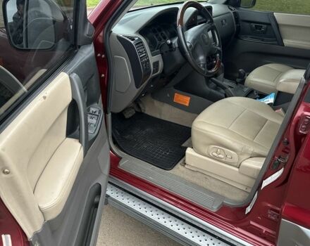 Красный Мицубиси Паджеро, объемом двигателя 3.5 л и пробегом 200 тыс. км за 8000 $, фото 2 на Automoto.ua