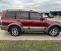 Красный Мицубиси Паджеро, объемом двигателя 3.5 л и пробегом 200 тыс. км за 8000 $, фото 6 на Automoto.ua