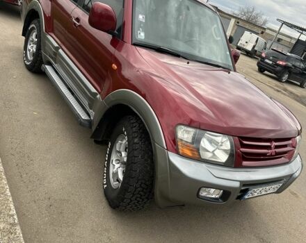 Красный Мицубиси Паджеро, объемом двигателя 3.5 л и пробегом 200 тыс. км за 8000 $, фото 4 на Automoto.ua