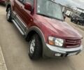 Красный Мицубиси Паджеро, объемом двигателя 3.5 л и пробегом 200 тыс. км за 8000 $, фото 4 на Automoto.ua