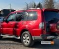 Красный Мицубиси Паджеро, объемом двигателя 3 л и пробегом 250 тыс. км за 10200 $, фото 3 на Automoto.ua