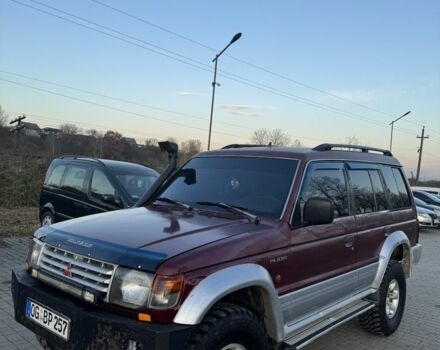 Красный Мицубиси Паджеро, объемом двигателя 2.5 л и пробегом 250 тыс. км за 5700 $, фото 1 на Automoto.ua