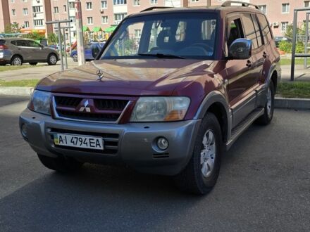 Червоний Міцубісі Паджеро, об'ємом двигуна 3 л та пробігом 374 тис. км за 5999 $, фото 1 на Automoto.ua