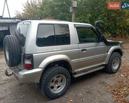 Сірий Міцубісі Паджеро, об'ємом двигуна 2.84 л та пробігом 360 тис. км за 10000 $, фото 3 на Automoto.ua