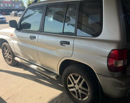 Серый Мицубиси Паджеро, объемом двигателя 1.8 л и пробегом 115 тыс. км за 6000 $, фото 2 на Automoto.ua