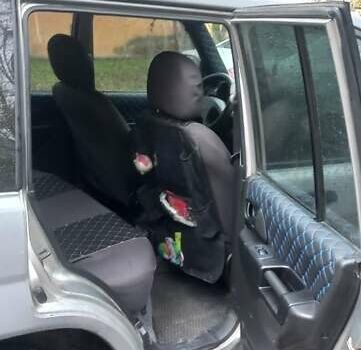 Серый Мицубиси Паджеро, объемом двигателя 1.8 л и пробегом 146 тыс. км за 4550 $, фото 8 на Automoto.ua