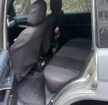 Серый Мицубиси Паджеро, объемом двигателя 1.8 л и пробегом 146 тыс. км за 4550 $, фото 7 на Automoto.ua