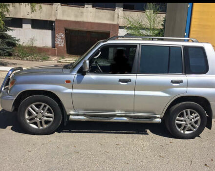 Серый Мицубиси Паджеро, объемом двигателя 1.8 л и пробегом 115 тыс. км за 6000 $, фото 9 на Automoto.ua