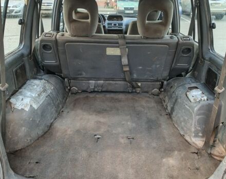 Серый Мицубиси Паджеро, объемом двигателя 3 л и пробегом 389 тыс. км за 3750 $, фото 4 на Automoto.ua