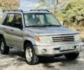 Серый Мицубиси Паджеро, объемом двигателя 1.8 л и пробегом 300 тыс. км за 1207 $, фото 1 на Automoto.ua