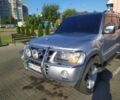 Серый Мицубиси Паджеро, объемом двигателя 3 л и пробегом 235 тыс. км за 9000 $, фото 1 на Automoto.ua