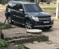 Серый Мицубиси Паджеро, объемом двигателя 3 л и пробегом 255 тыс. км за 12000 $, фото 1 на Automoto.ua