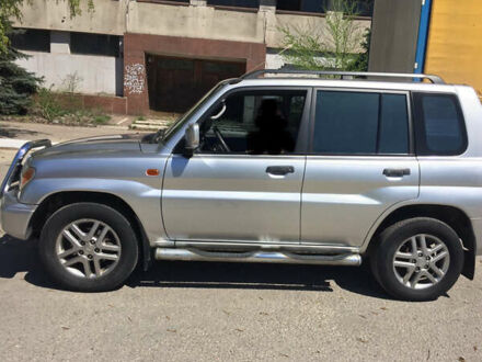 Серый Мицубиси Паджеро, объемом двигателя 1.8 л и пробегом 115 тыс. км за 6000 $, фото 1 на Automoto.ua