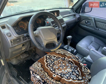 Синий Мицубиси Паджеро, объемом двигателя 3 л и пробегом 322 тыс. км за 5000 $, фото 5 на Automoto.ua