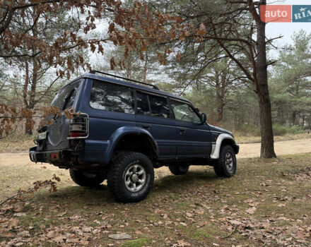 Синий Мицубиси Паджеро, объемом двигателя 3.5 л и пробегом 305 тыс. км за 5300 $, фото 3 на Automoto.ua