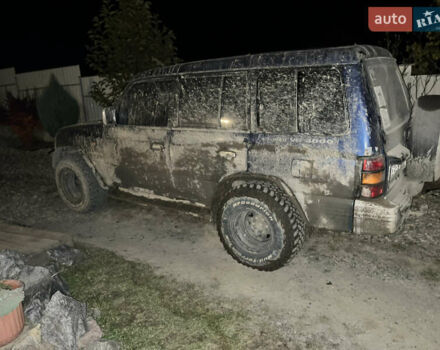 Синий Мицубиси Паджеро, объемом двигателя 2.97 л и пробегом 280 тыс. км за 6500 $, фото 1 на Automoto.ua