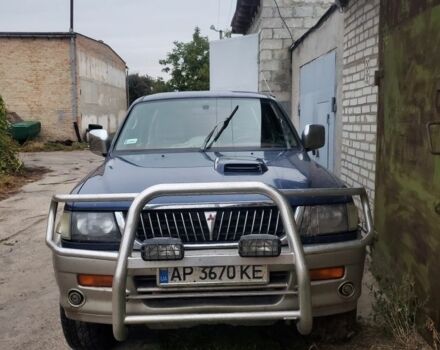 Синий Мицубиси Паджеро, объемом двигателя 2.5 л и пробегом 300 тыс. км за 3700 $, фото 1 на Automoto.ua