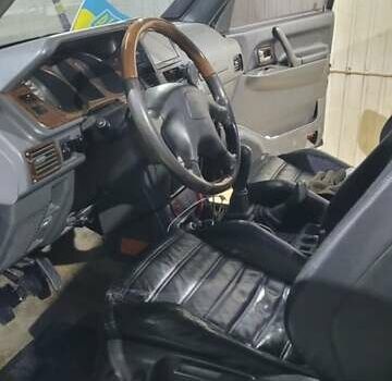 Синій Міцубісі Паджеро, об'ємом двигуна 2.84 л та пробігом 384 тис. км за 9500 $, фото 5 на Automoto.ua