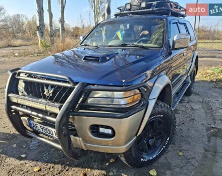 Синий Мицубиси Паджеро, объемом двигателя 2.48 л и пробегом 380 тыс. км за 7999 $, фото 2 на Automoto.ua