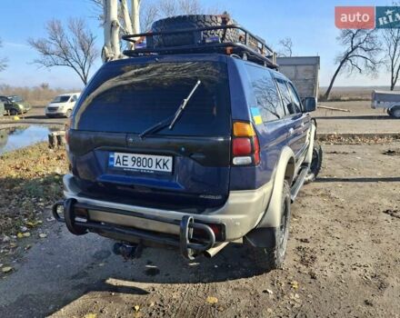 Синий Мицубиси Паджеро, объемом двигателя 2.48 л и пробегом 380 тыс. км за 7999 $, фото 3 на Automoto.ua