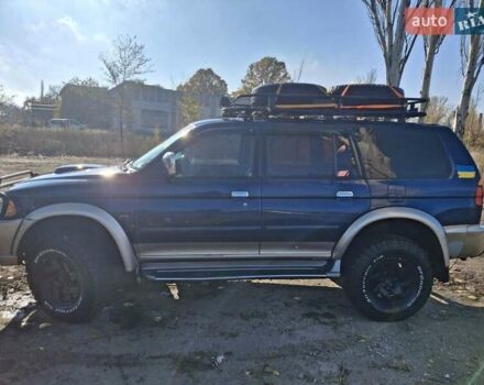 Синий Мицубиси Паджеро, объемом двигателя 2.48 л и пробегом 380 тыс. км за 7999 $, фото 1 на Automoto.ua